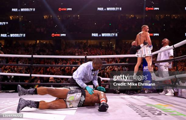 Jake Paul reacts to knocking out Tyron Woodley in the sixth round during an eight-round cruiserweight bout at the Amalie Arena on December 18, 2021...