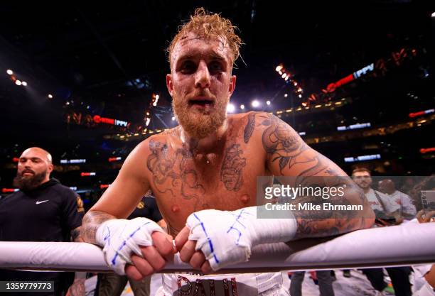 Jake Paul reacts to knocking out Tyron Woodley in the sixth round during an eight-round cruiserweight bout at the Amalie Arena on December 18, 2021...