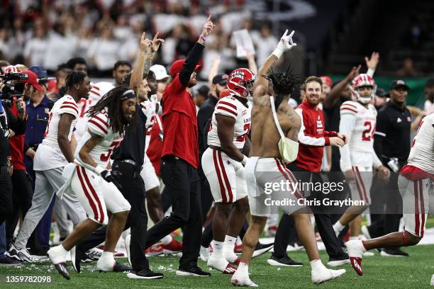 The Louisiana-Lafayette Ragin Cajuns react after defating the Marshall Thundering Herd during the R+L Carriers New Orleans Bowl at Caesars Superdome...