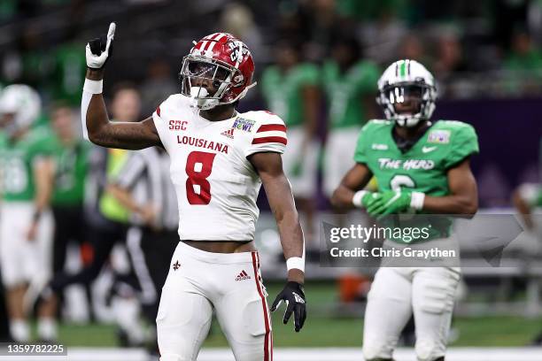 Michael Jefferson of the Louisiana-Lafayette Ragin Cajuns reacts after catching a pass over Micah Abraham of the Marshall Thundering Herd during the...