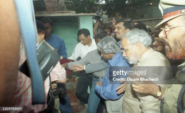 Abdul Kalam, President of India, with Narendra Modi, Chief Minister of Gujarat, at Naroda Patiya area in Ahmedabad on 12th August 2002.