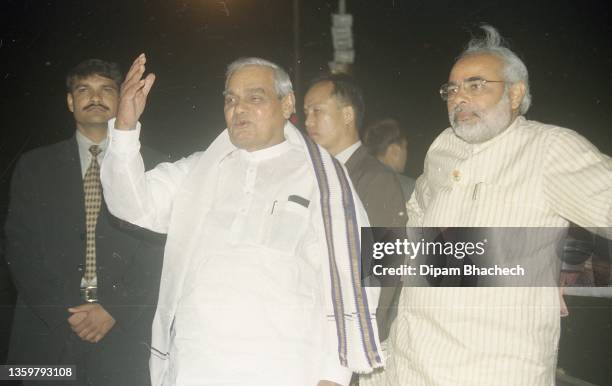 Atal Bihari Vajpayee, Prime Minister of India, with Narendra Modi, Chief Minister of Gujarat, at Ellis Bridge Ahmedabad Gujarat to observe water flow...