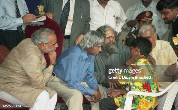 Abdul Kalam, President of India, with Narendra Modi, Chief Minister of Gujarat, at Naroda Patiya area in Ahmedabad on 12th August 2002.