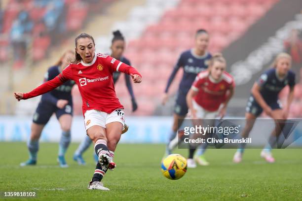 Katie Zelem of Manchester United scores their side's first goal from the penalty spot during the Barclays FA Women's Super League match between...