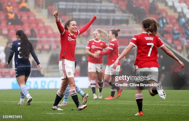 Lucy Staniforth of Manchester United celebrates after scoring their side's third goal during the Barclays FA Women's Super League match between...