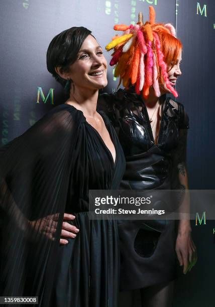 Actress Carrie-Anne Moss and Director Producer and Writer Lana Wachowski attend "The Matrix Resurrections" Red Carpet U.S. Premiere Screening at The...