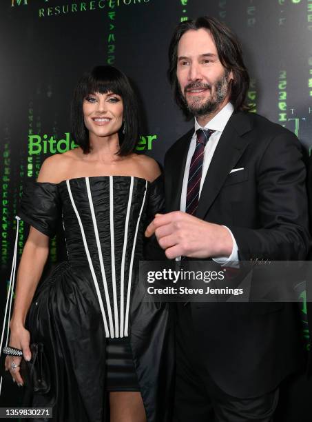 Actress Ellen Hollman and Actor Keanu Reeves attend "The Matrix Resurrections" Red Carpet U.S. Premiere Screening at The Castro Theatre on December...