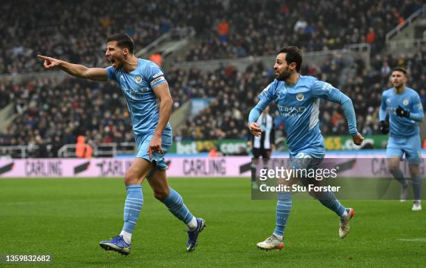 Ruben Dias of Manchester City celebrates after scoring their sides first goal during the Premier League match between Newcastle United and Manchester...
