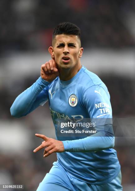 Joao Cancelo of Manchester City celebrates after scoring their sides second goal during the Premier League match between Newcastle United and...