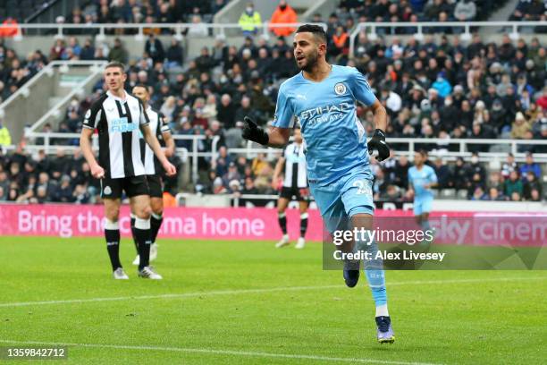 Riyad Mahrez of Manchester City celebrates after scoring their sides third goal during the Premier League match between Newcastle United and...