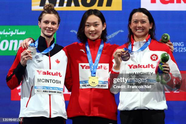 Summer Mcintosh of Canada poses with the silver medal, Bingjie Li of China poses with the gold medal and Siobhan Haughey of Hong Kong poses with the...