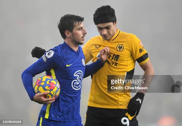 Mason Mount of Chelsea clashes with Raul Jimenez of Wolverhampton Wanderers during the Premier League match between Wolverhampton Wanderers and...