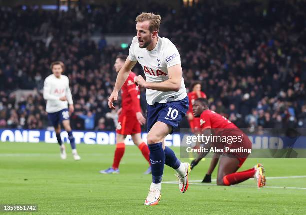 Harry Kane of Tottenham Hotspur celebrates after scoring their team's first goal during the Premier League match between Tottenham Hotspur and...