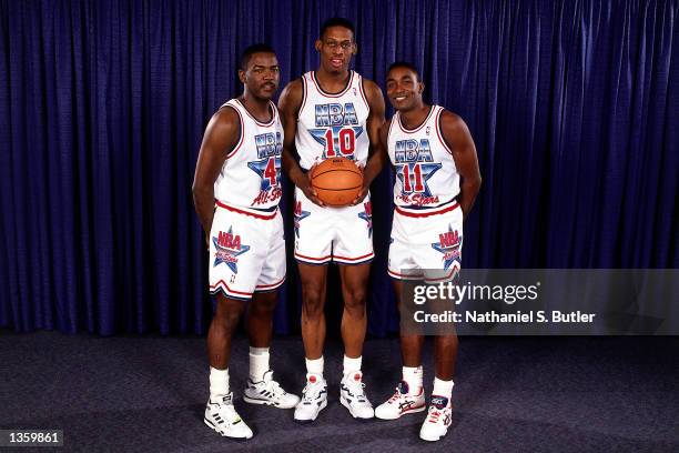 Joe Dumars, Dennis Rodman and Isiah Thomas of the Detroit Pistons pose for a portrait before the 1992 All Star game in Orlando, Florida. NOTE TO...
