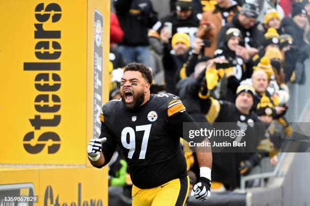 Cameron Heyward of the Pittsburgh Steelers runs onto the field during player introductions prior to the game against the Tennessee Titans at Heinz...
