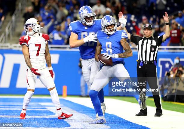 Josh Reynolds of the Detroit Lions celebrates with Brock Wright after Reynolds scored on a receiving touchdown in the second quarter against the...