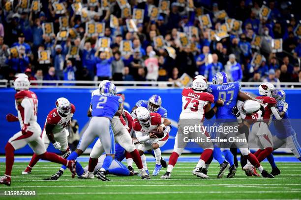 Charles Harris of the Detroit Lions sacks Kyler Murray of the Arizona Cardinals in the second quarter at Ford Field on December 19, 2021 in Detroit,...