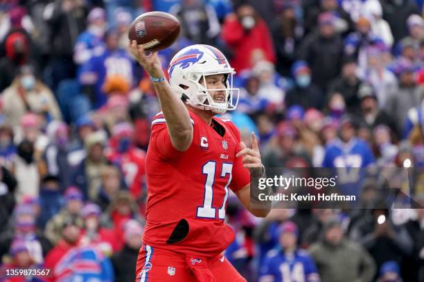 Josh Allen of the Buffalo Bills delivers a pass for first down in the second quarter of the game against the Carolina Panthers at Highmark Stadium on...