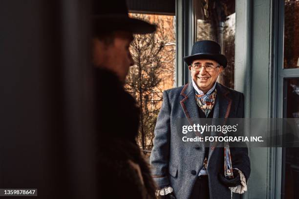 carol singers getting ready - reenactment stock pictures, royalty-free photos & images