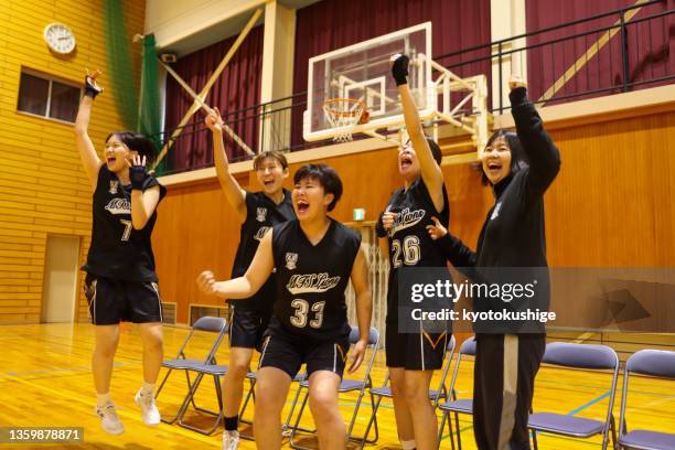 young female team celebrating victory - スポーツ用語 ストックフォトと画像