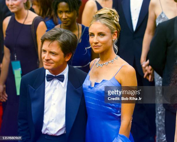 Michael J. Fox and Tracy Pollan arrive at the Emmy Awards Show, September 8, 1996 in Los Angeles, California.