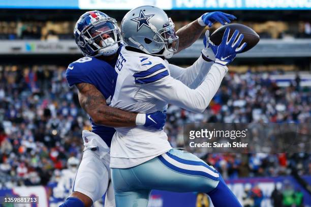 Trevon Diggs of the Dallas Cowboys intercepts a pass in the endzone that was intended for Kenny Golladay of the New York Giants during the fourth...