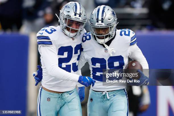 Malik Hooker of the Dallas Cowboys celebrates with Darian Thompson after making an interception during the fourth quarter against the New York Giants...