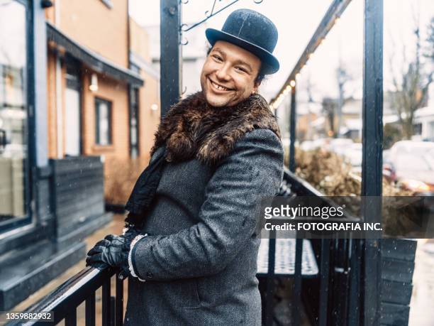 gay man carol singer posing on the street - lgbt history stock pictures, royalty-free photos & images