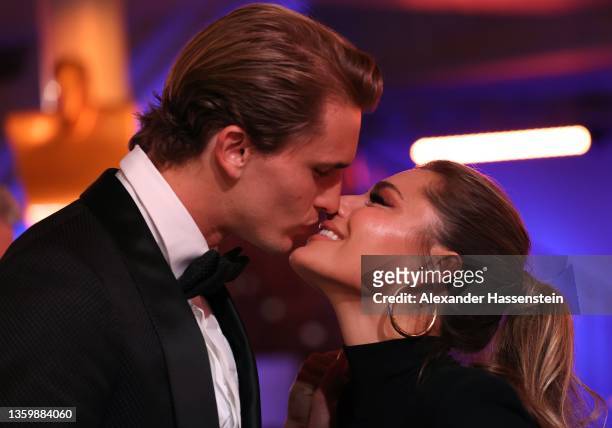 Alexander Zverev kisses Sophia Thomalla after awarded as the "Sportsman of the Year" 2021 during the "Sportler des Jahres" Award 2021 Gala at Kurhaus...