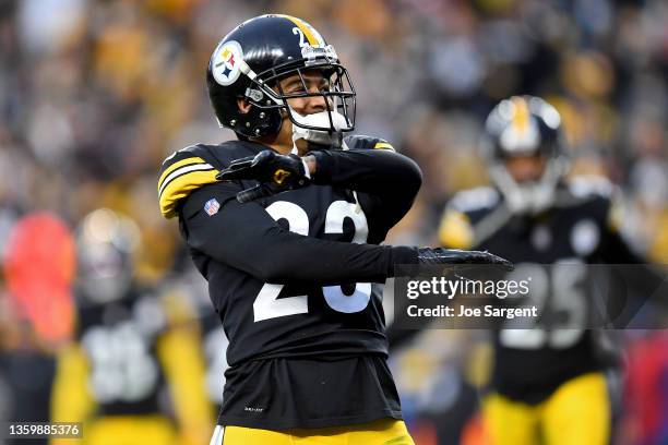 Joe Haden of the Pittsburgh Steelers celebrates a stop on fourth down in the fourth quarter to end the game at Heinz Field on December 19, 2021 in...