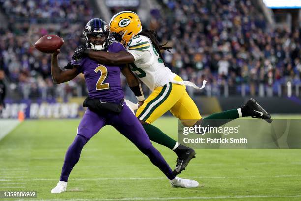 De'Vondre Campbell of the Green Bay Packers sacks Tyler Huntley of the Baltimore Ravens in the first quarter at M&T Bank Stadium on December 19, 2021...