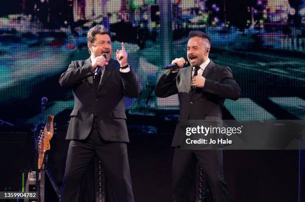 Michael Ball and Alfie Boe performs on stage at The O2 Arena on December 19, 2021 in London, England.