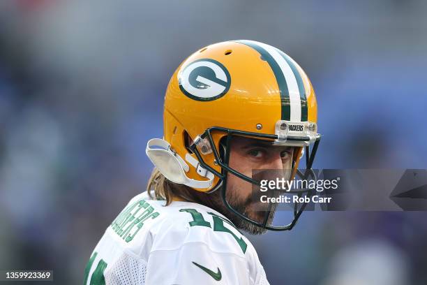 Quarterback Aaron Rodgers of the Green Bay Packers warms up against the Baltimore Ravens in the first half at M&T Bank Stadium on December 19, 2021...