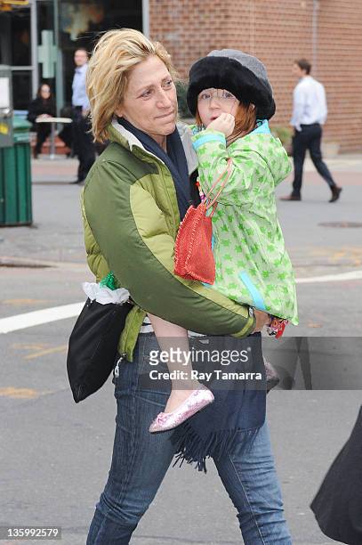 Actress Edie Falco and her daughter Macy Falco walk in Tribeca on December 15, 2011 in New York City.