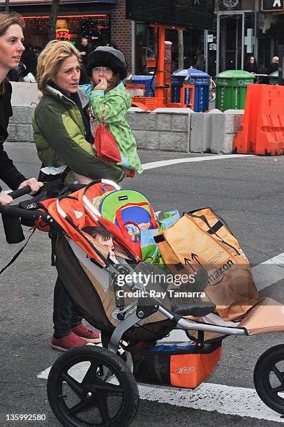 Actress Edie Falco, Anderson Falco, and Macy Falco walk in Tribeca on December 15, 2011 in New York City.