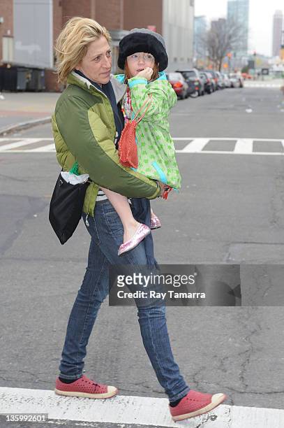 Actress Edie Falco and her daughter Macy Falco walk in Tribeca on December 15, 2011 in New York City.