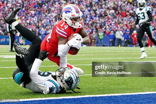 Stefon Diggs of the Buffalo Bills catches an eleven-yard pass over Stephon Gilmore of the Carolina Panthers and runs in for a touchdown in the second...