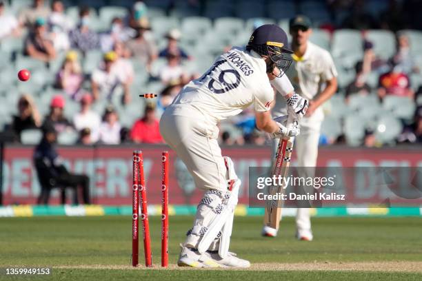 Chris Woakes of England is bowled by Jhye Richardson of Australia for 44 runs during day five of the Second Test match in the Ashes series between...