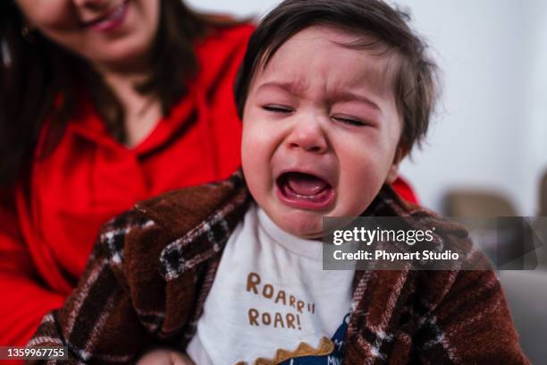 crying toddler - baby pout stock pictures, royalty-free photos & images