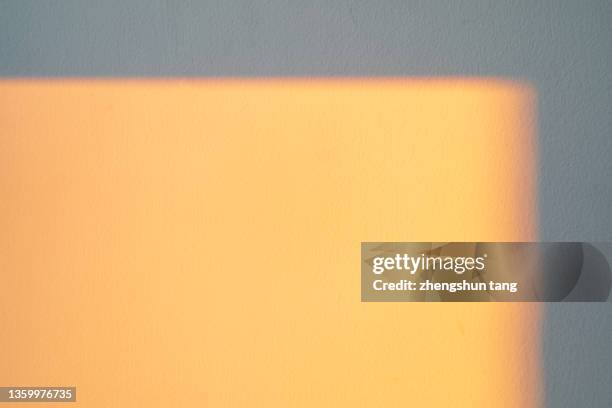 shadow of window on wall at sunrise. - bright room stock pictures, royalty-free photos & images