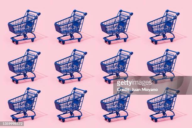 blue shopping carts - repetition concept stock pictures, royalty-free photos & images