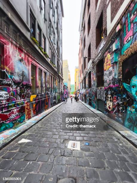 graffiti covered alley in melbourne, australia - melbourne art stock pictures, royalty-free photos & images