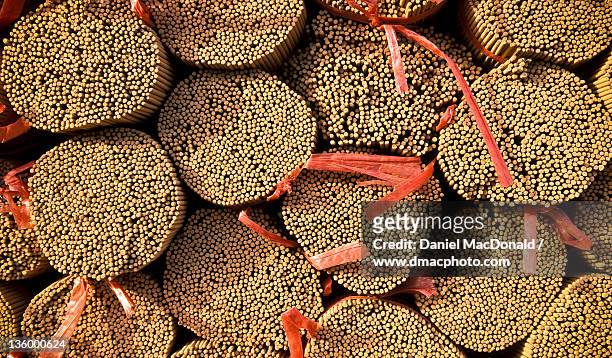 bundles of sandalwood incense - sandalwood fotografías e imágenes de stock