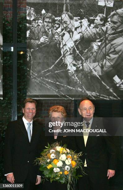 The leader of the FDP Guido Westerwelle, Barbara Genscher , and former German Foreign minister Hans-Dietrich Genscher pose for photographers in the...