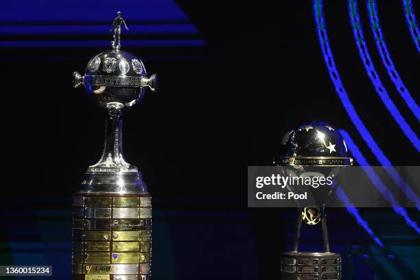 The Copa Libertadores and Copa Sudamericana trophies displayed ahead of CONMEBOL competitions draw on December 20, 2021 in Asuncion, Paraguay.
