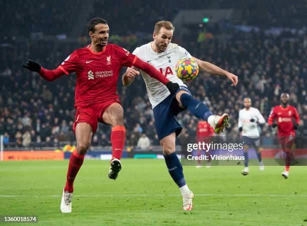 Harry Kane of Tottenham Hotspur and Joël Matip of Liverpool during the Premier League match between Tottenham Hotspur and Liverpool at Tottenham...