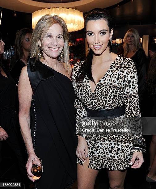 Cici Bussey and Kim Kardashian during the grand opening of Kardashian Khaos at The Mirage Hotel and Casino on December 15, 2011 in Las Vegas, Nevada.