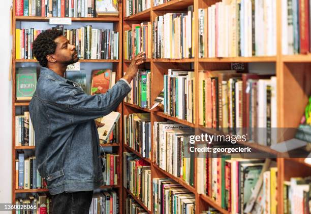 looking for a book - librarian stock pictures, royalty-free photos & images