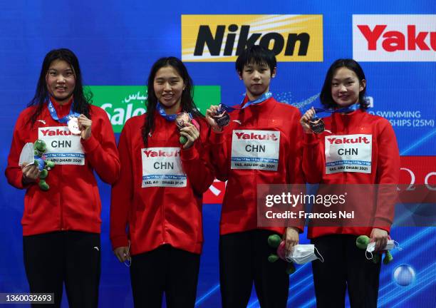 Bingjie Li, Yujie Cheng, Menghui Zhu and Yaxin Liu of China pose with the Bronze Medal after the Women's 4x200m Freestyle Relay Final during day five...