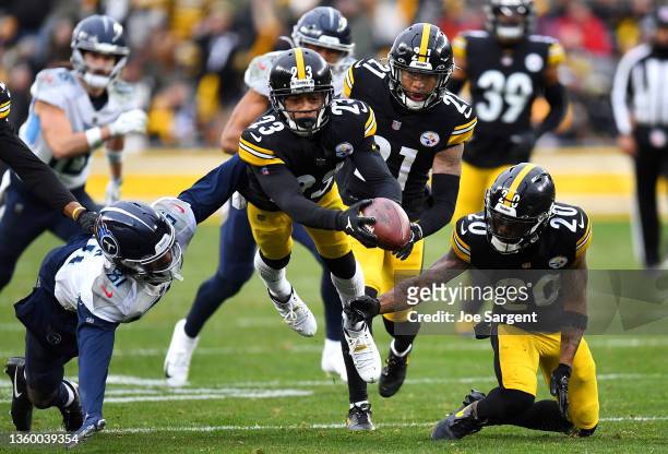 Joe Haden of the Pittsburgh Steelers recovers a fumble by Racey McMath of the Tennessee Titans in the third quarter of the game at Heinz Field on...